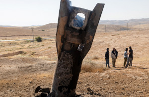 <p>Israeli settlers stand next to part of a missile protruding from the ground, following strikes from Iran, in the central Israeli-occupied West Bank, June 8, 2026. REUTERS/Naama Stern ISRAEL OUT. NO COMMERCIAL OR EDITORIAL SALES IN ISRAEL</p>
