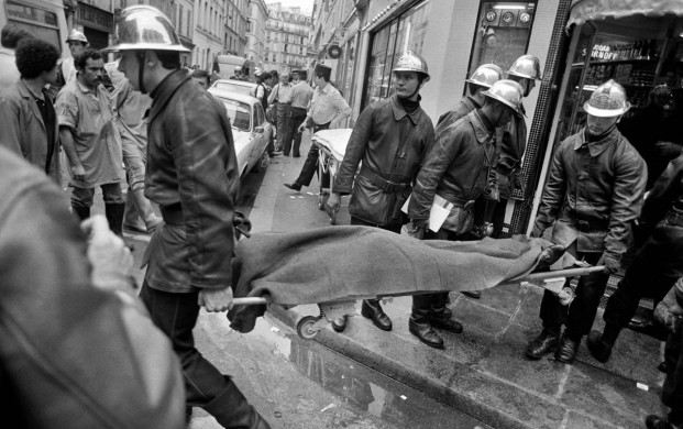 <p>(FILES) In this file photo taken on August 9, 1982, firemen and a rescuers evacuate a body after the French-Jewish delicatessen restaurant Jo Goldenberg was attacked on rue des Rosiers in Paris by gunmen who threw a grenade into the establishement and shot at customers with sub-machine guns, killing six and injuring 22 others. - The August 9, 1982 attack is attributed to Abu Nidal Organisation - Fatah Revolutionary Council (Fatah-RC), a Palestinian group dissident from the Palestine Liberation Organisation (PLO). (Photo by MICHEL CLEMENT / AFP)</p>