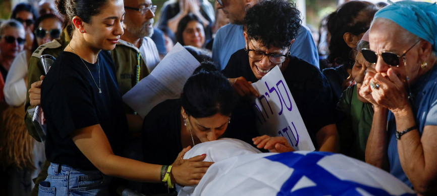 <p>Mourners pay respects to Eden Yerushalmi, a hostage whose body was retrieved from Gazan captivity and brought to Israel along with those of five others, after she was kidnapped during the deadly October 7 attack on Israel by Hamas, at her funeral in Petach Tikva, Israel, September 1, 2024. REUTERS/Shir Torem</p>