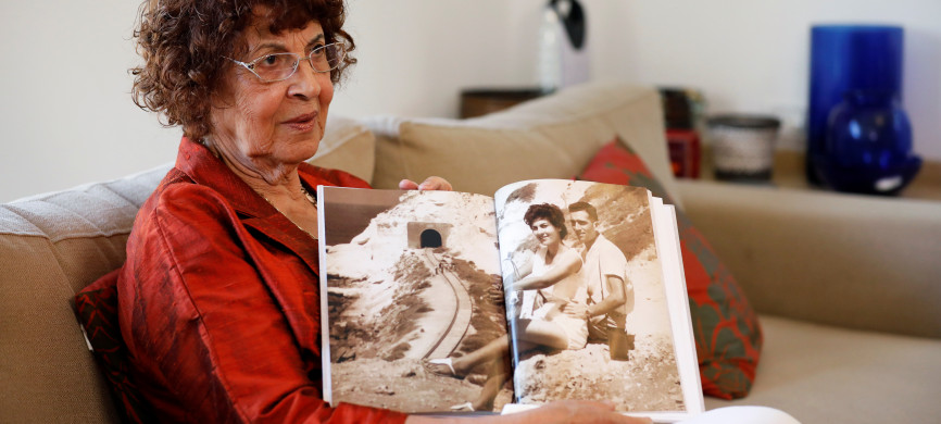 <p>Nadia, widow of Israeli spy Eli Cohen, shows a photograph of herself with her late husband, during an interview with Reuters in Herzliya, Israel October 6, 2019. REUTERS/Amir Cohen</p>